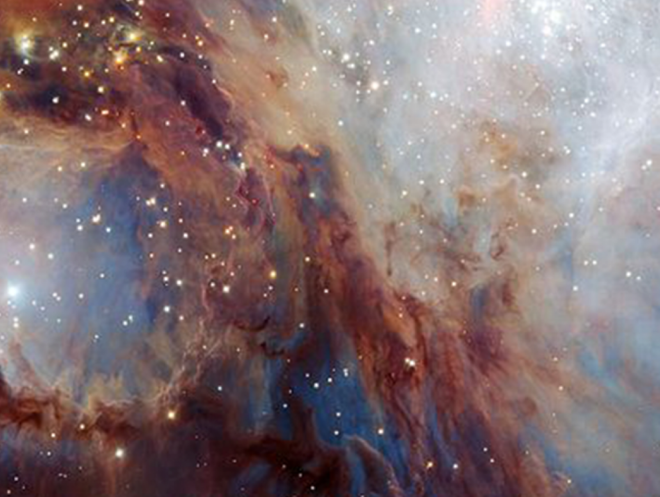 part of the Orion Nebula: a colorful nebula with a lot of young stars
