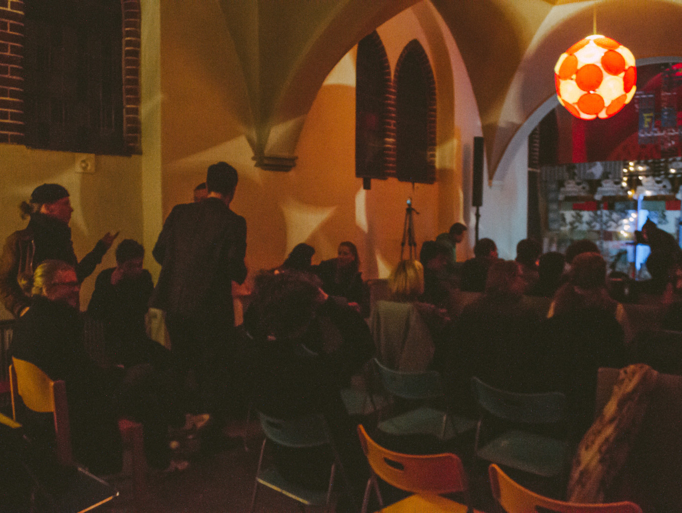 An audience getting ready for a concert.