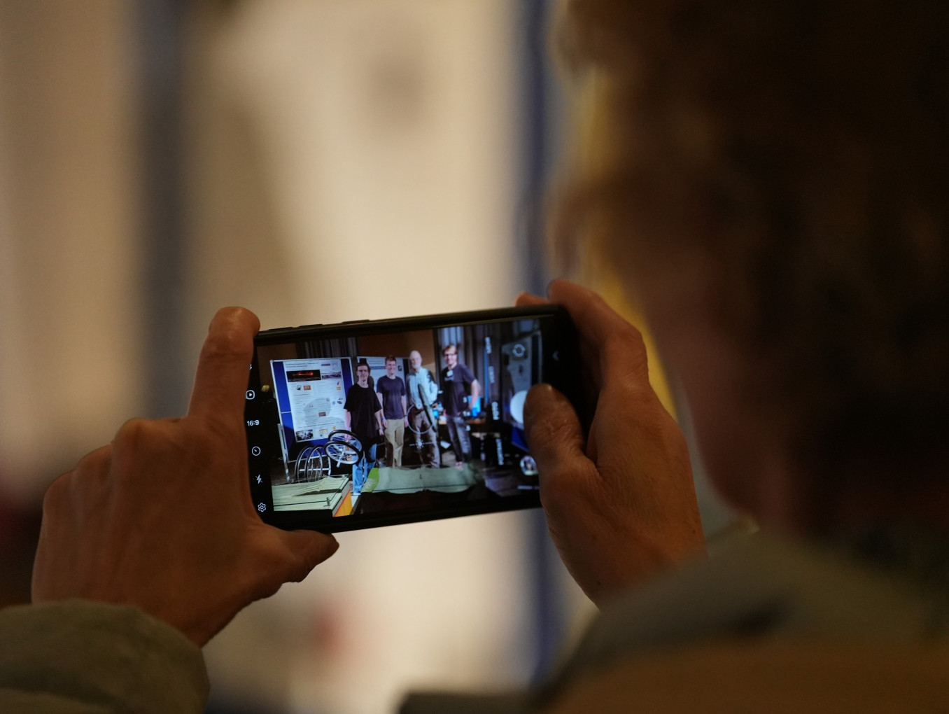 A close up of a phone screen as someone takes a photo on it. 