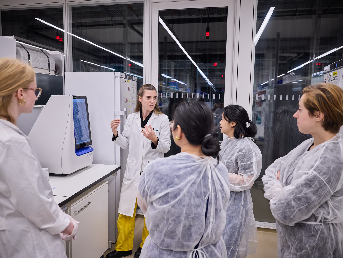 Women scientists explain their research to the public. 