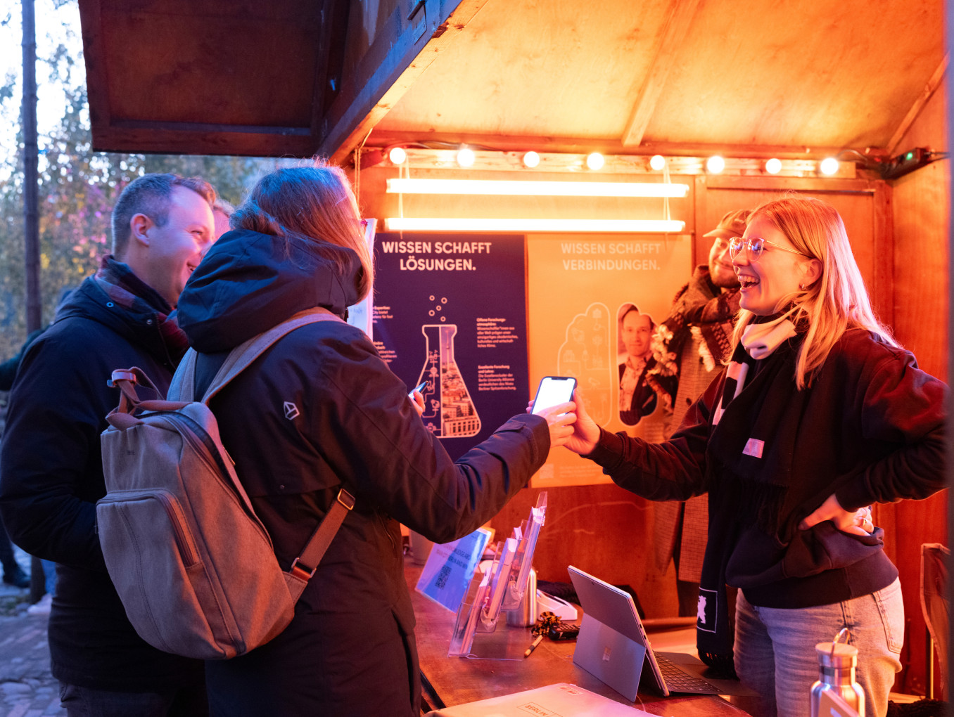 A woman shares her research with the public. 