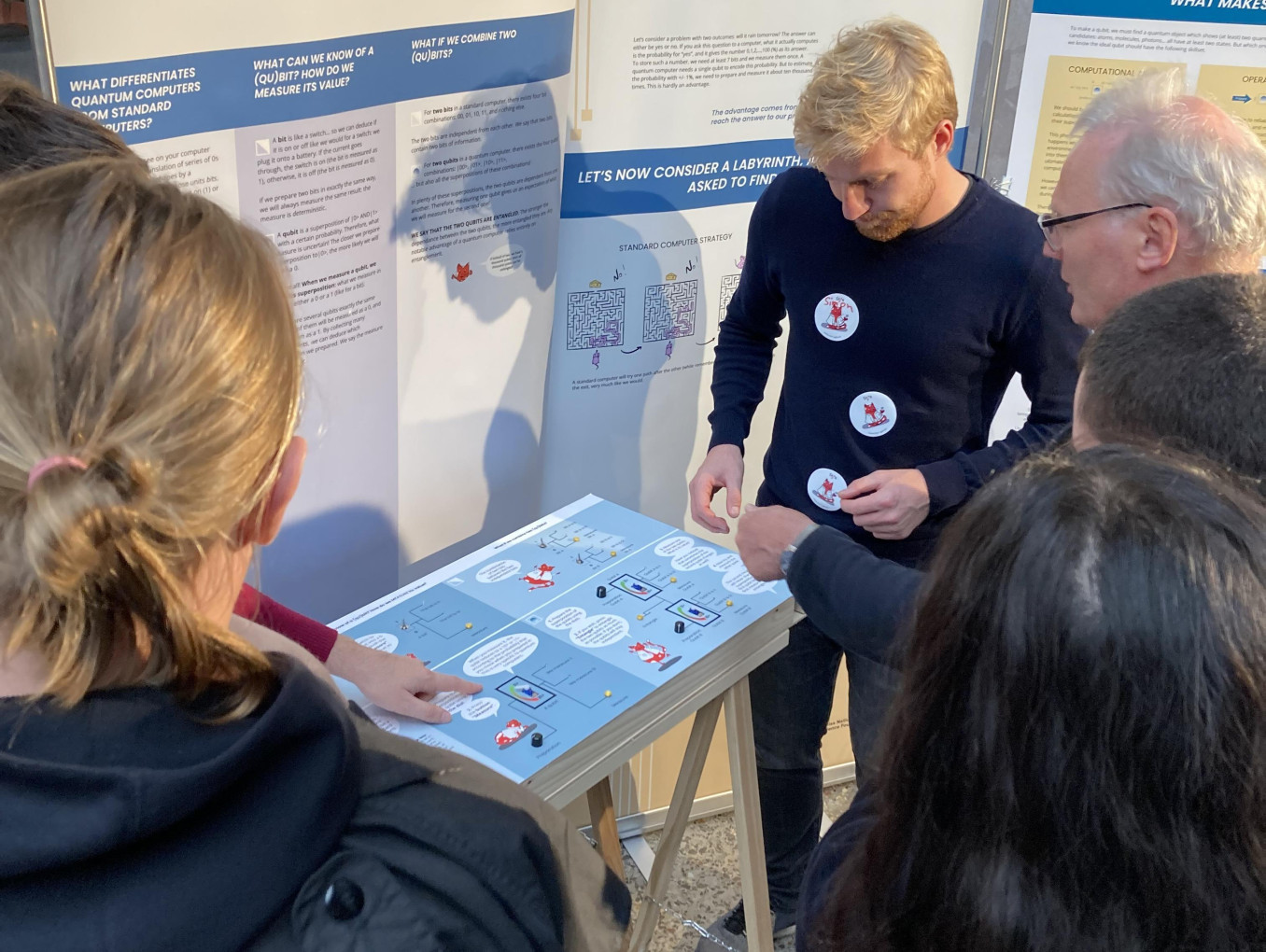 NCCR SPIN researcher at the booth