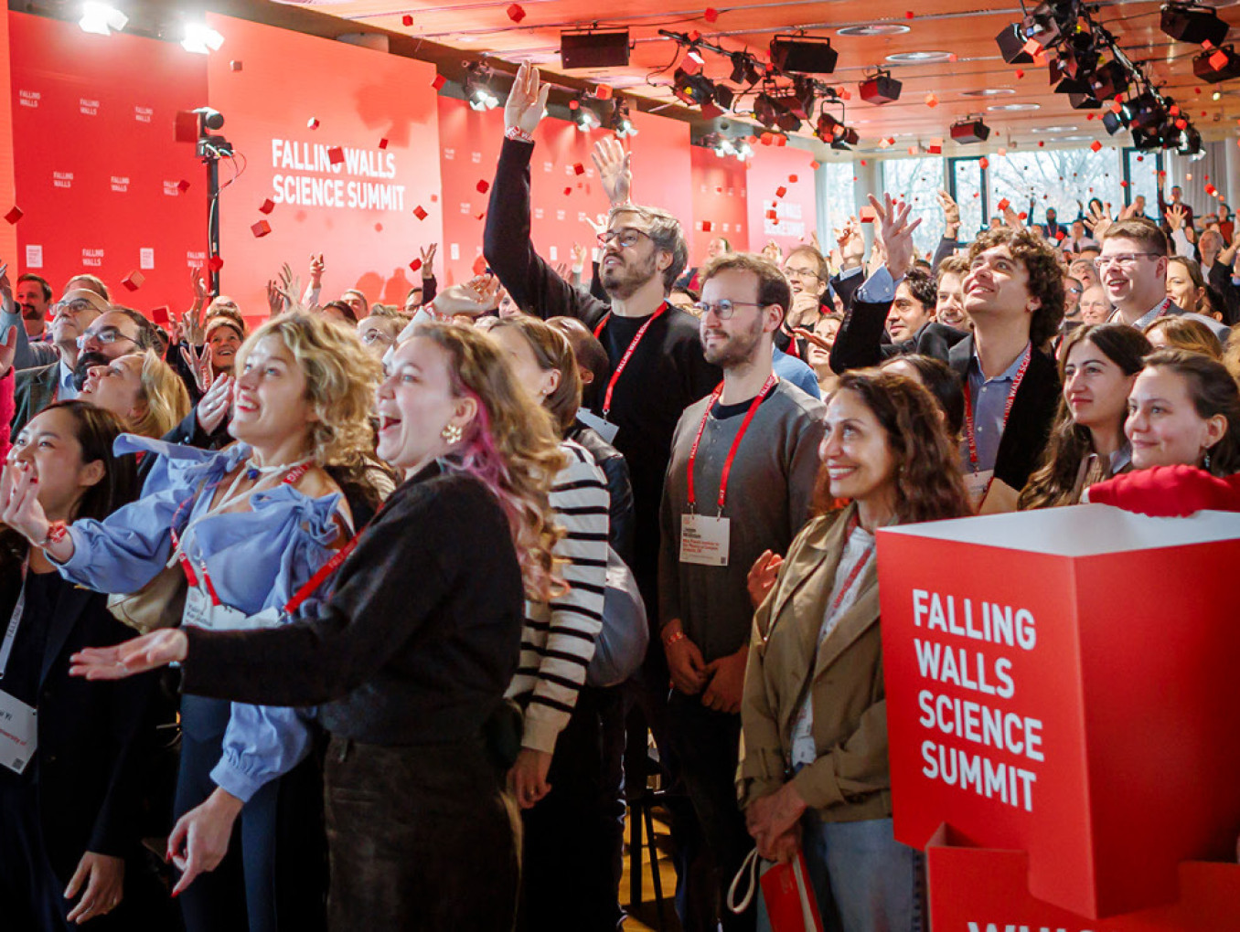 Crowd cheering at end of conference.