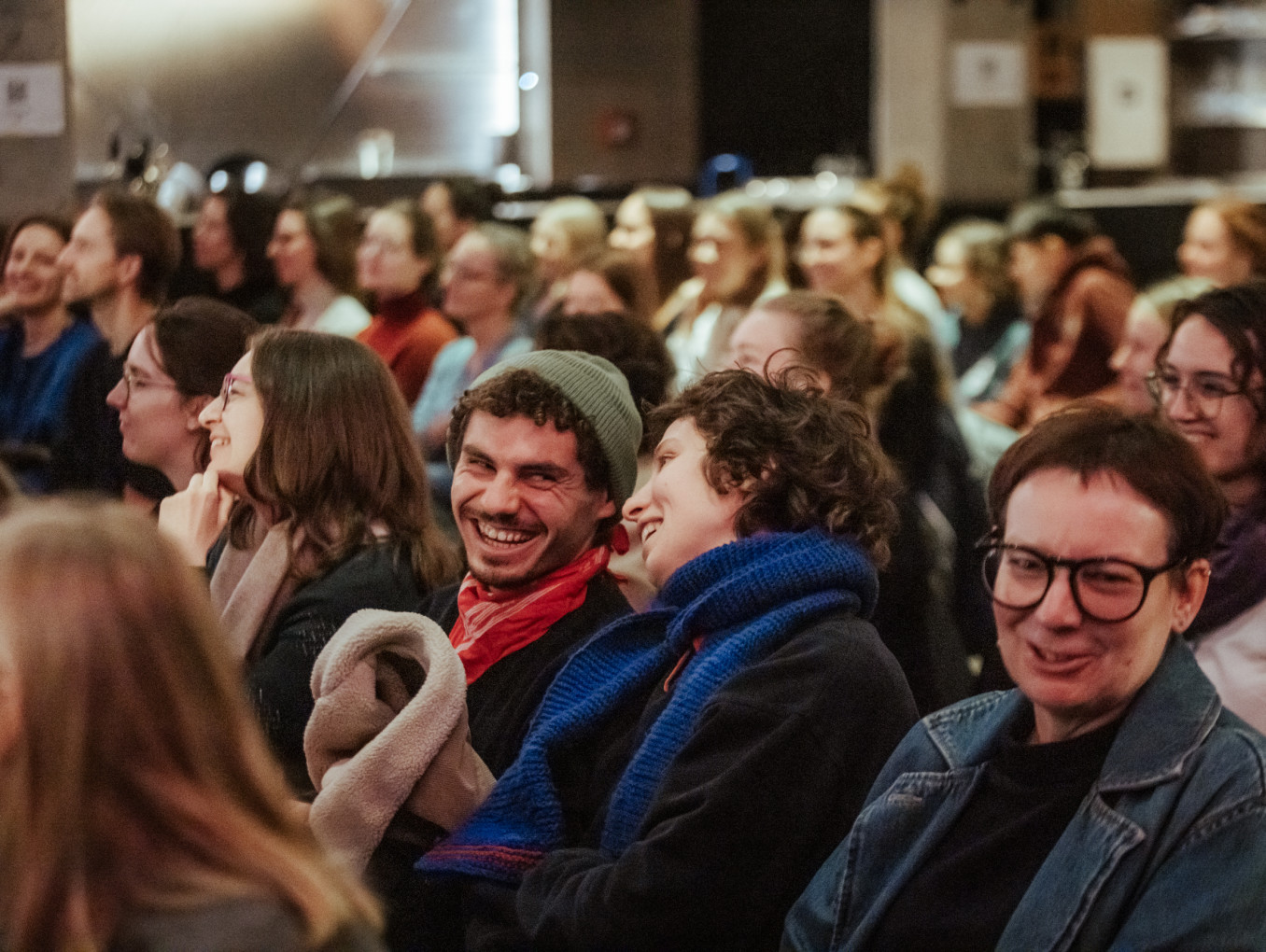 Audience laughing.