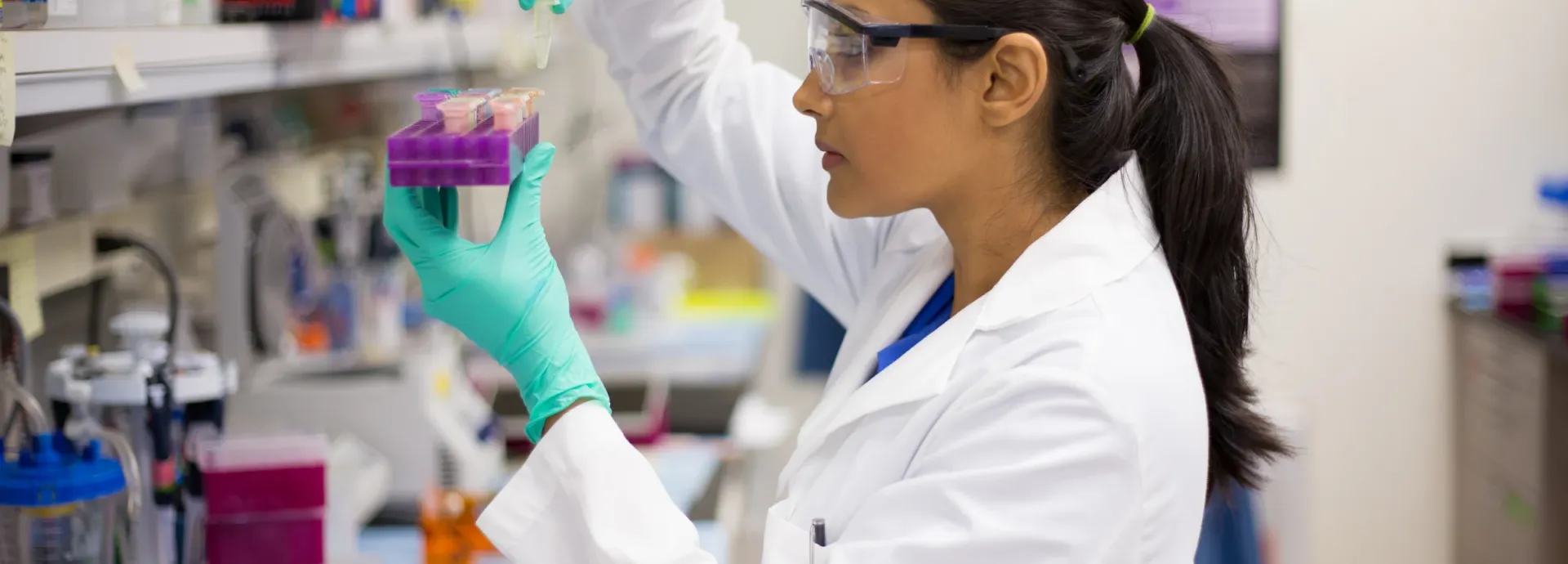 woman in a lab conducting an experiment