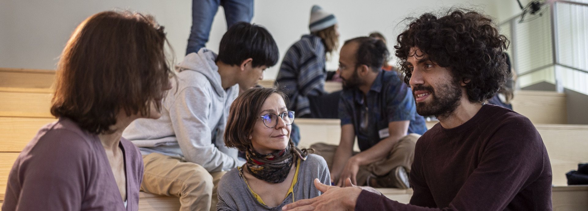 A group sits together brainstorming.