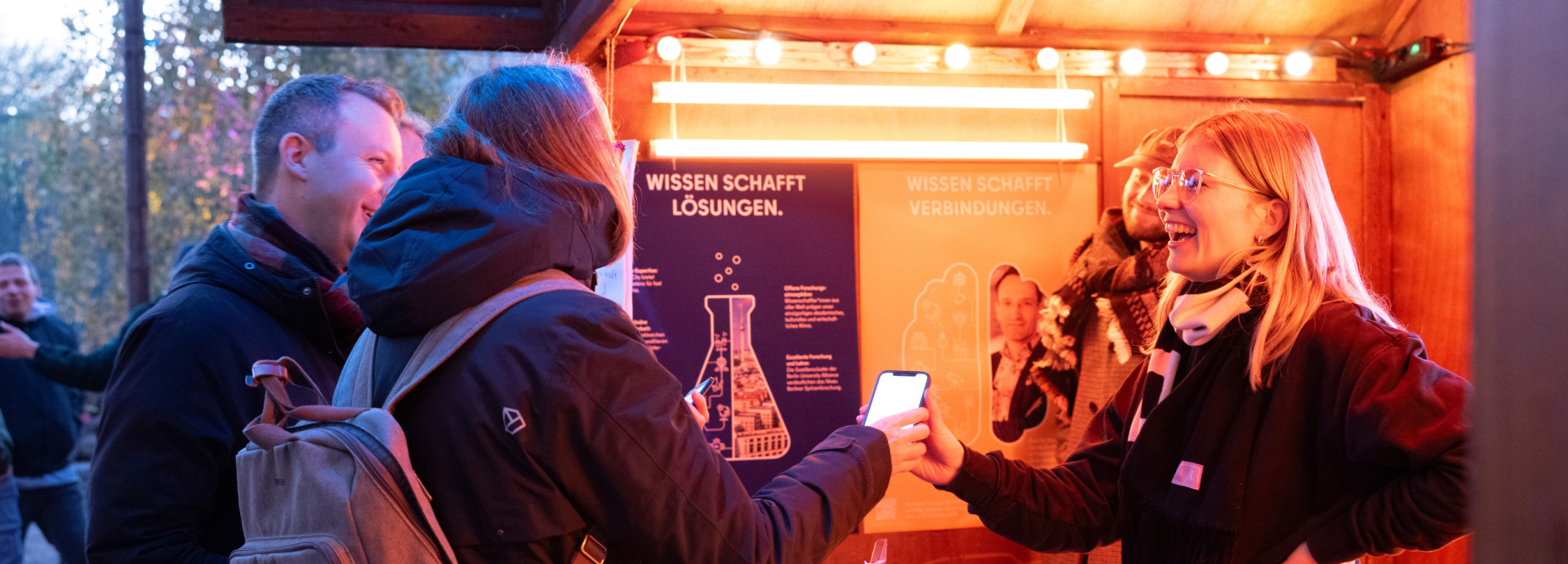 A woman shares her research with the public. 