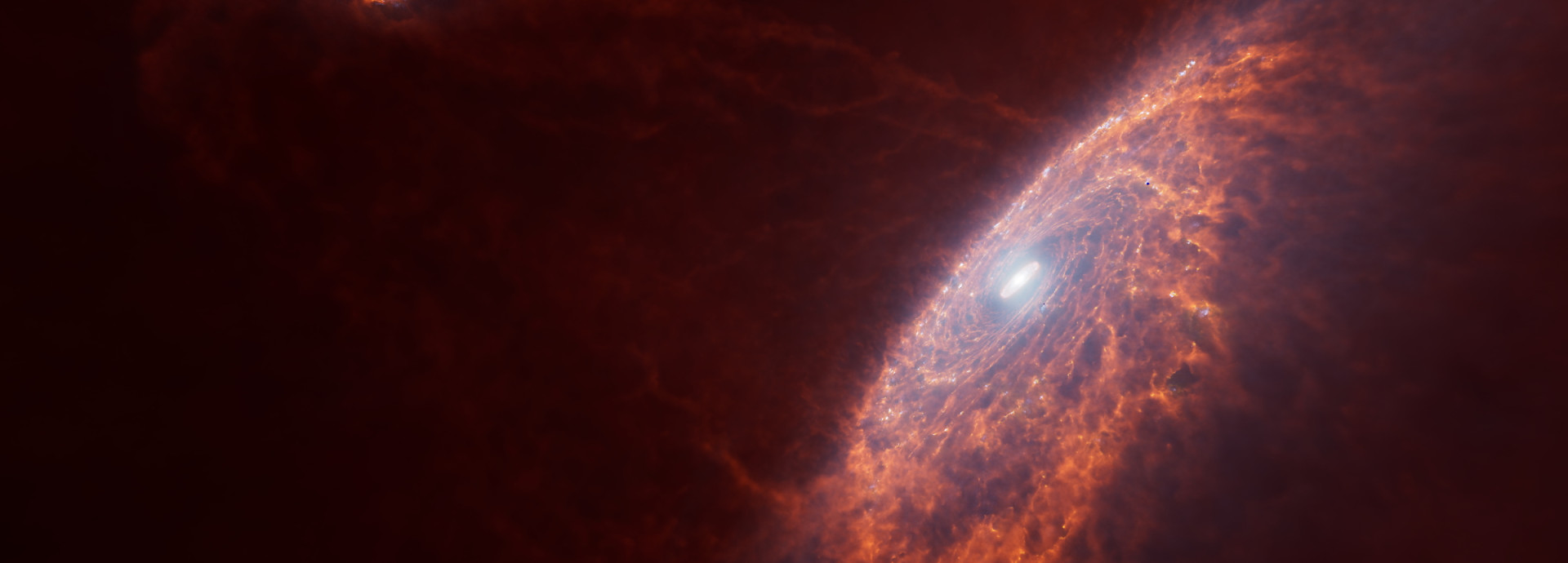 Zwei rätliche Spiralgalaxien, eine im Vordergrund rechts, eine links hinten, die sich aufeinander zu bewegen.