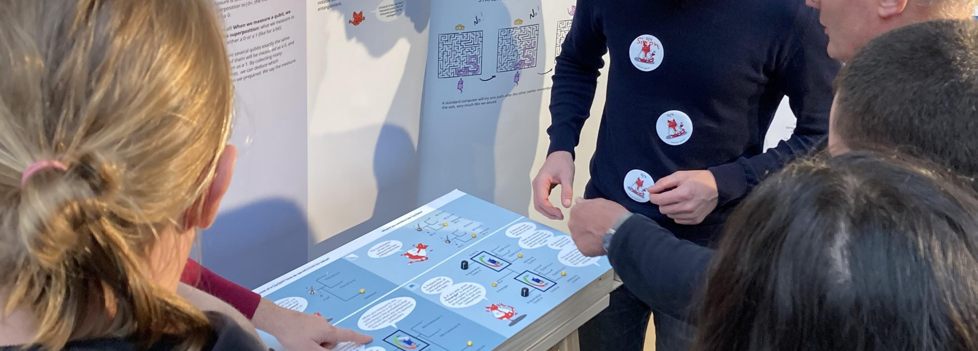 NCCR SPIN researcher at the booth