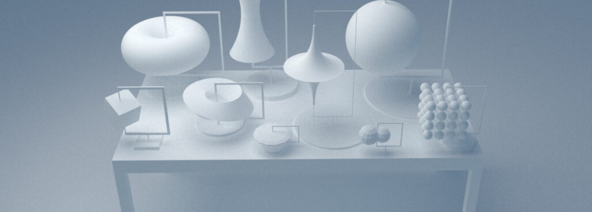 A minimalist display of various abstract white geometric shapes on a table against a soft blue background.