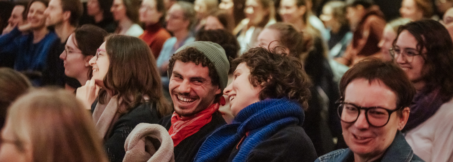 Audience laughing.
