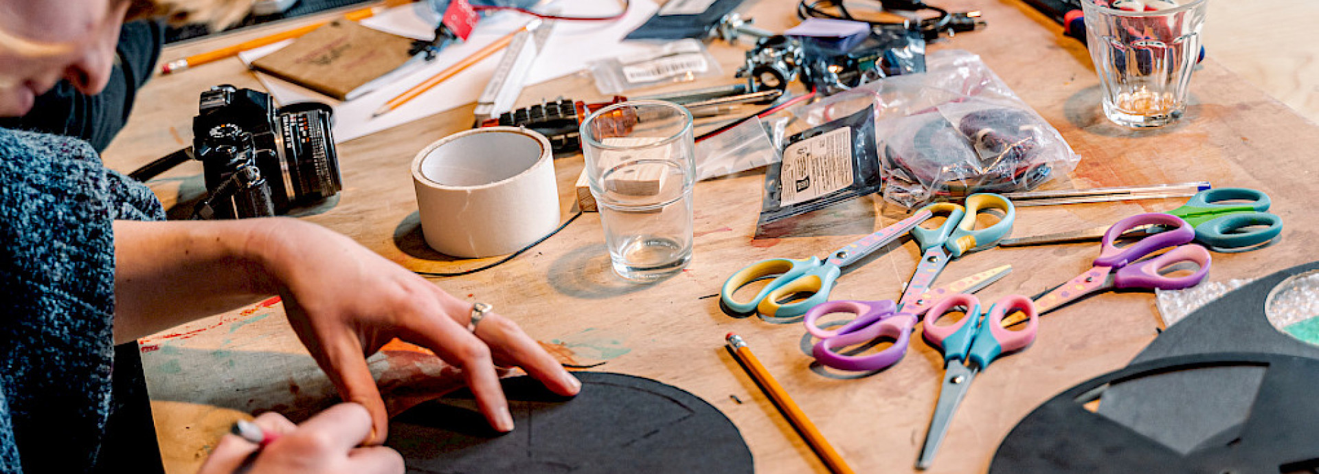 Participants construct motorized external shutters during a hands-on photography and film workshop at SAVVY Contemporary, Berlin.