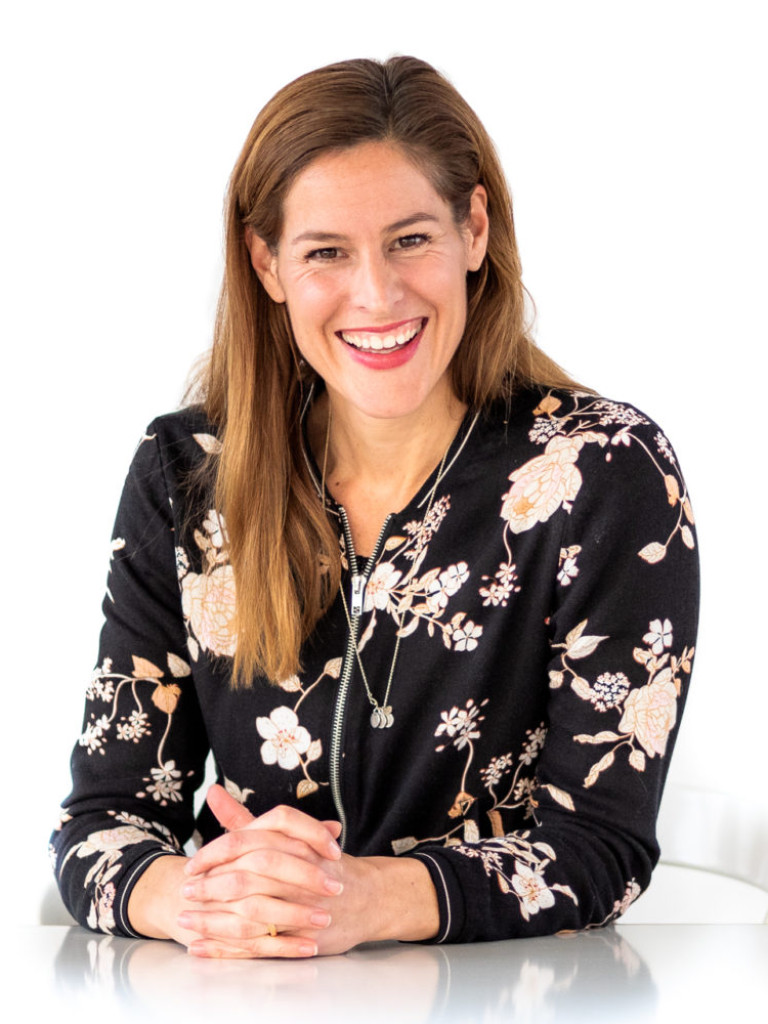 Woman in floral blouse.