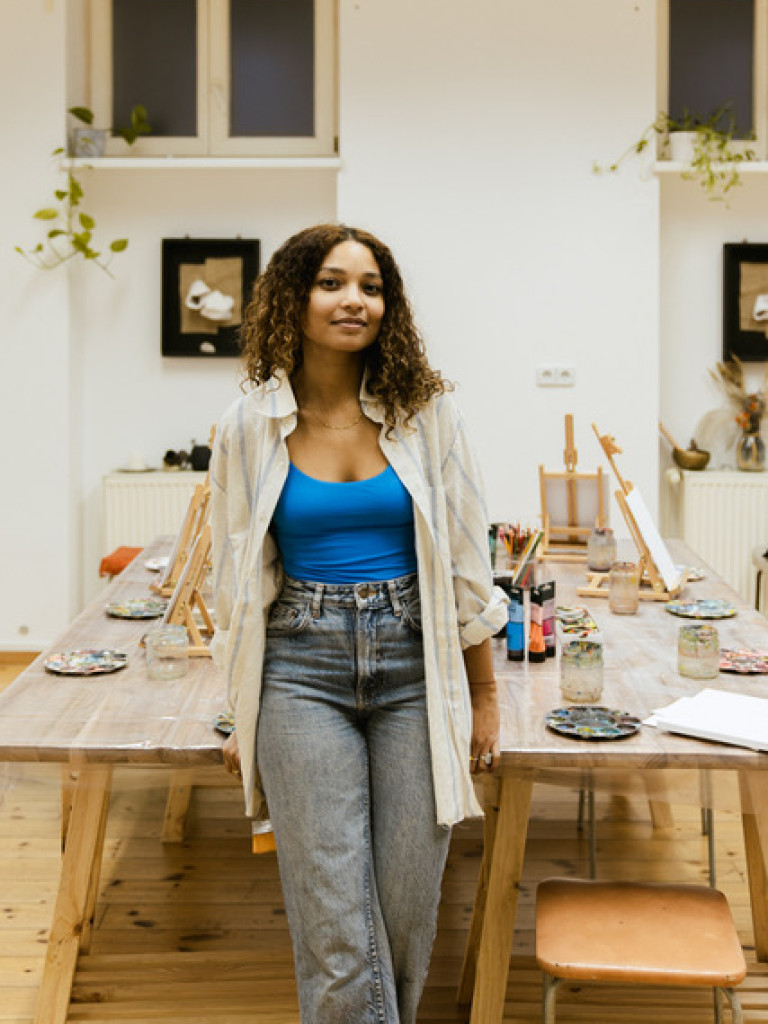 Thuli Wolf Standing by the desk