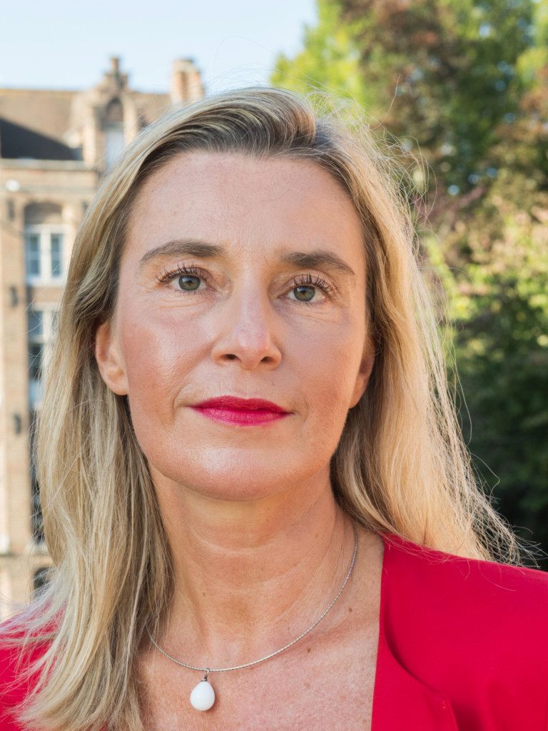 Image of Federica Mogherini with a building in Bruges in the background