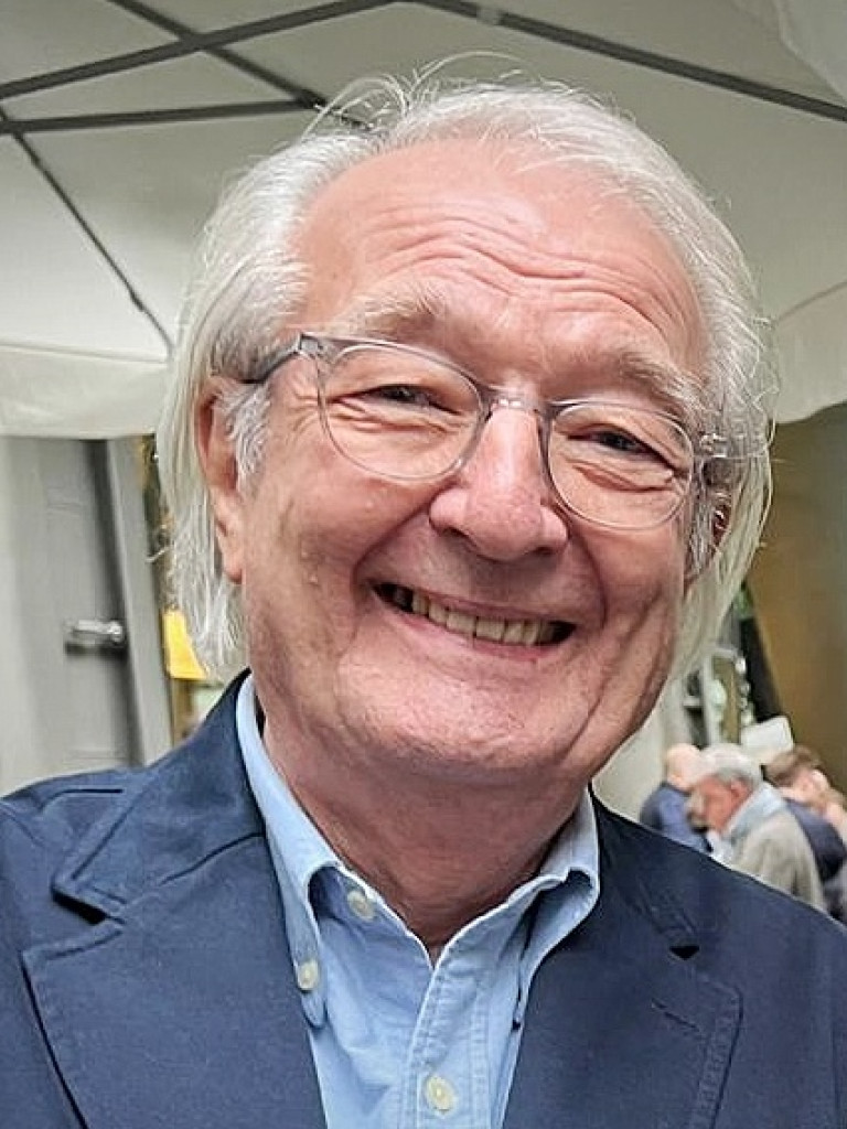 Men in his 70s with blue blazer