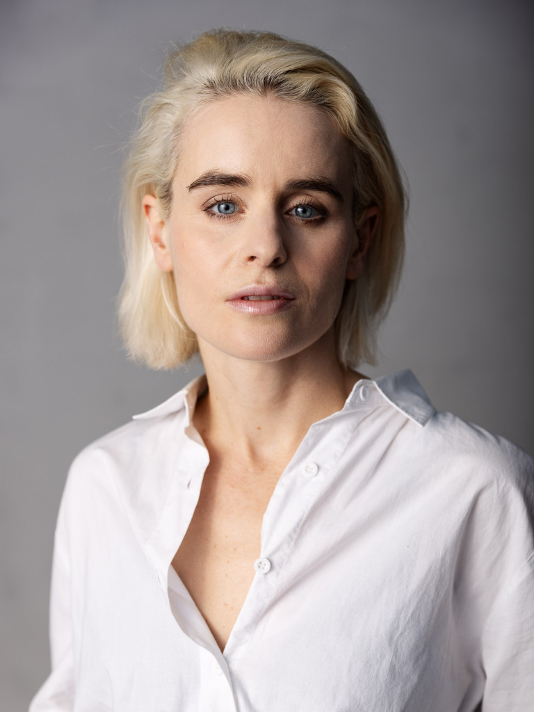 Color headshot of Lori Baldwin against a neutral background