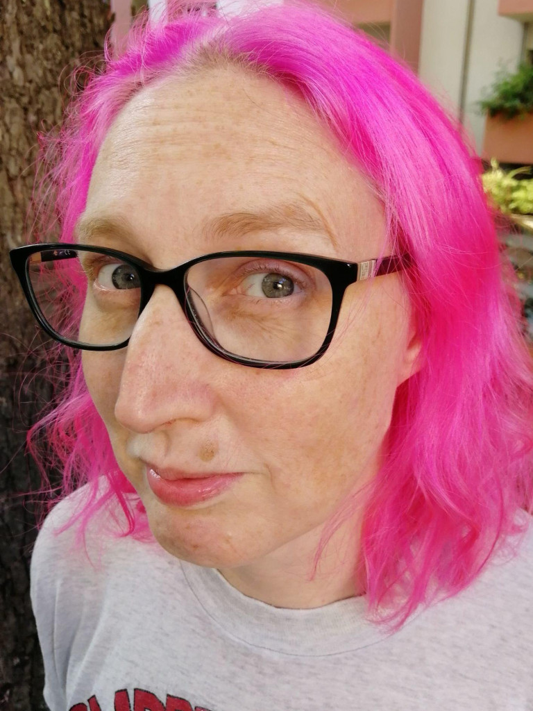 Woman with pink hair