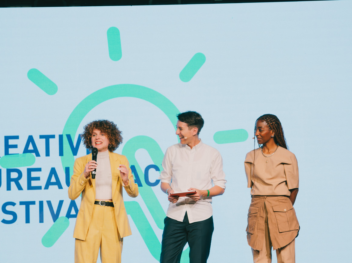 moderators of the festival on stage 