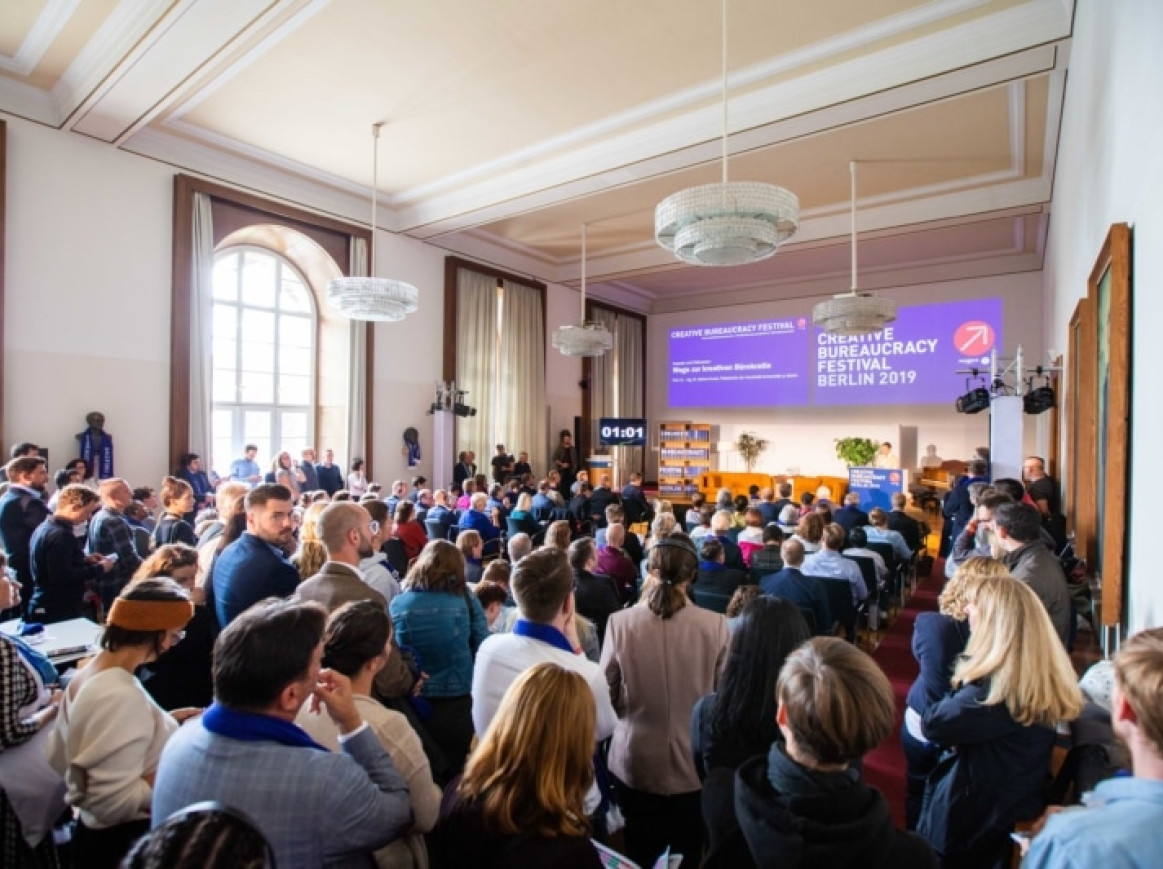 people listening to a presentation 
