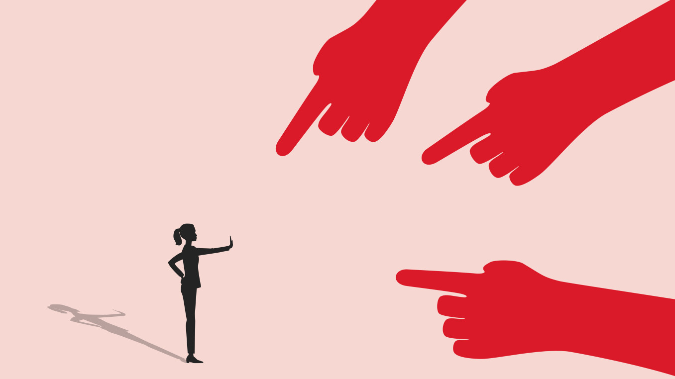 Woman stopping hands pointing at her