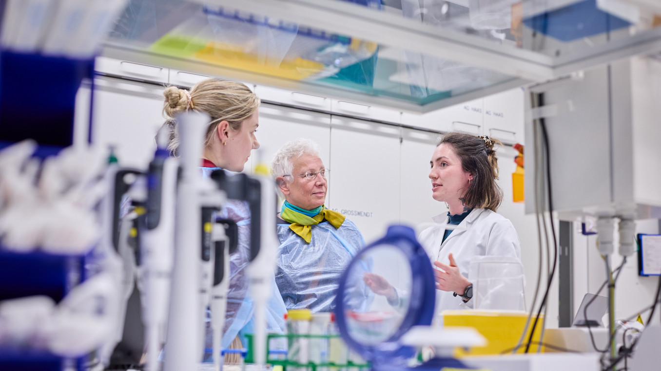 People stand in a laboratory 