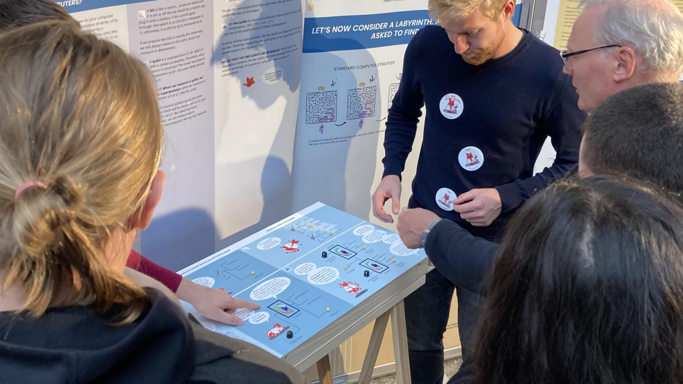 NCCR SPIN researcher at the booth