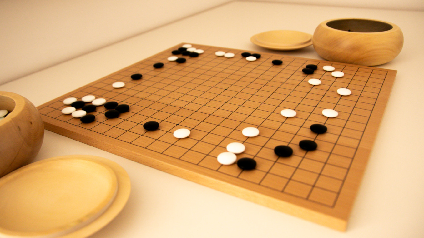 Game of Go: black and white stones on a Go board